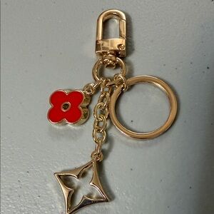 LV Gold-Tone Keychain with Red Flower and Star Charms